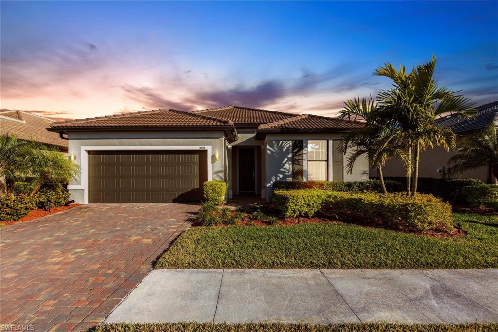 3032 Walnut Grove Lane Alva, FL 33920 - Photo 1 of 49 front view of a house with a yard