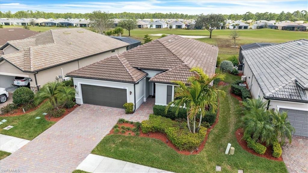 3032 Walnut Grove Lane Alva, FL 33920 - Photo 3 of 49 an aerial view of a house with outdoor space and lake view