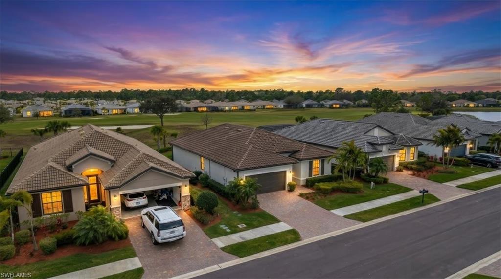 3032 Walnut Grove Lane Alva, FL 33920 - Photo 38 of 49 an aerial view of a house with a garden