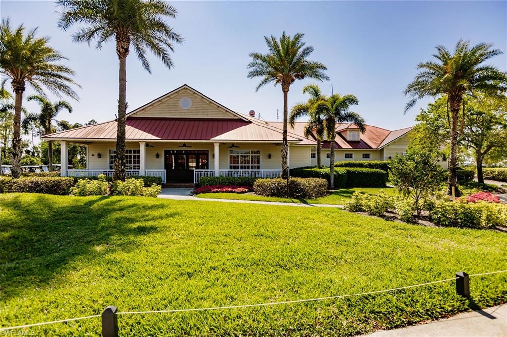 3032 Walnut Grove Lane Alva, FL 33920 - Photo 39 of 49 a view of a swimming pool with plants and palm trees