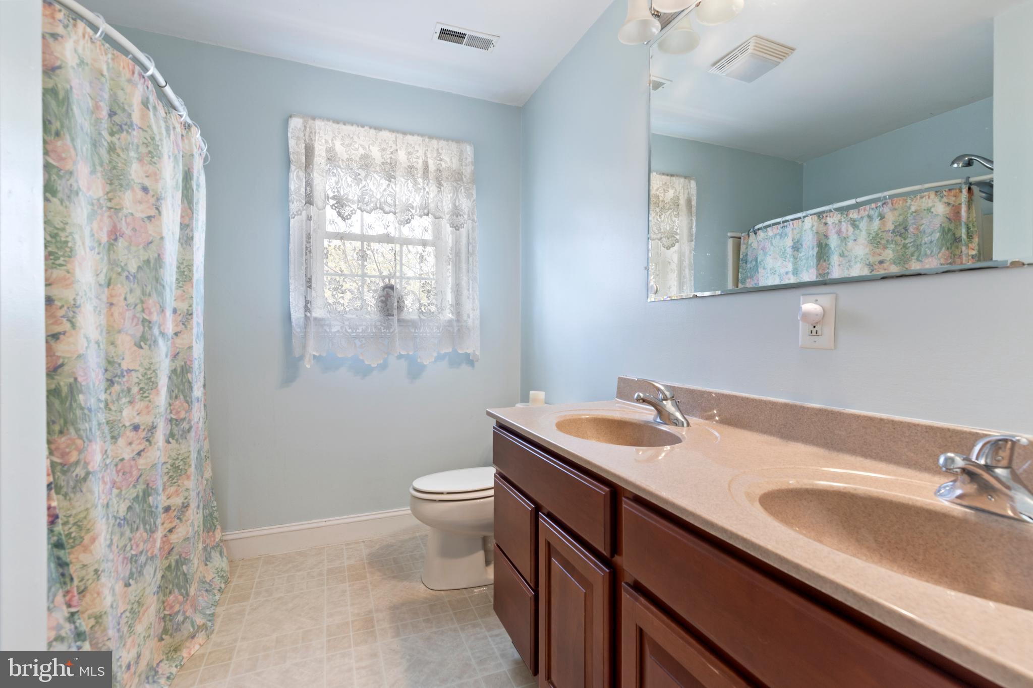 3336 Hunting Ridge Road Winchester, VA 22603 - Photo 24 of 50 a bathroom with a sink and a toilet