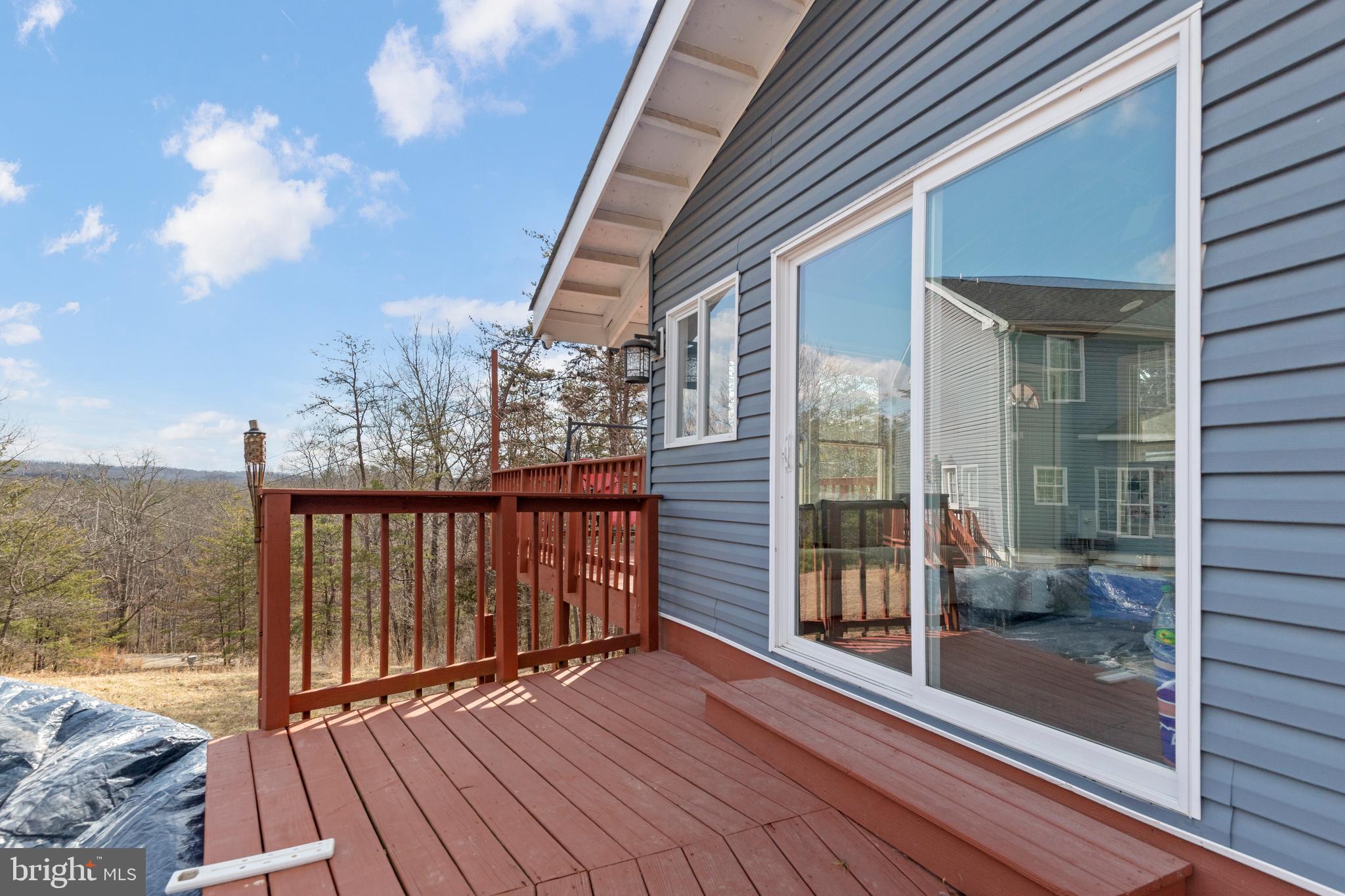 3336 Hunting Ridge Road Winchester, VA 22603 - Photo 39 of 50 a view of a balcony with wooden floor