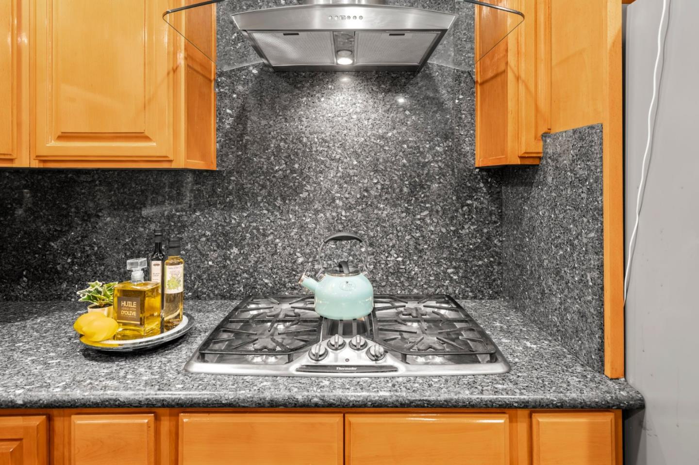 489 Hassinger Road San Jose, CA 95111 - Photo 15 of 41 a bathroom with a granite countertop sink and a mirror