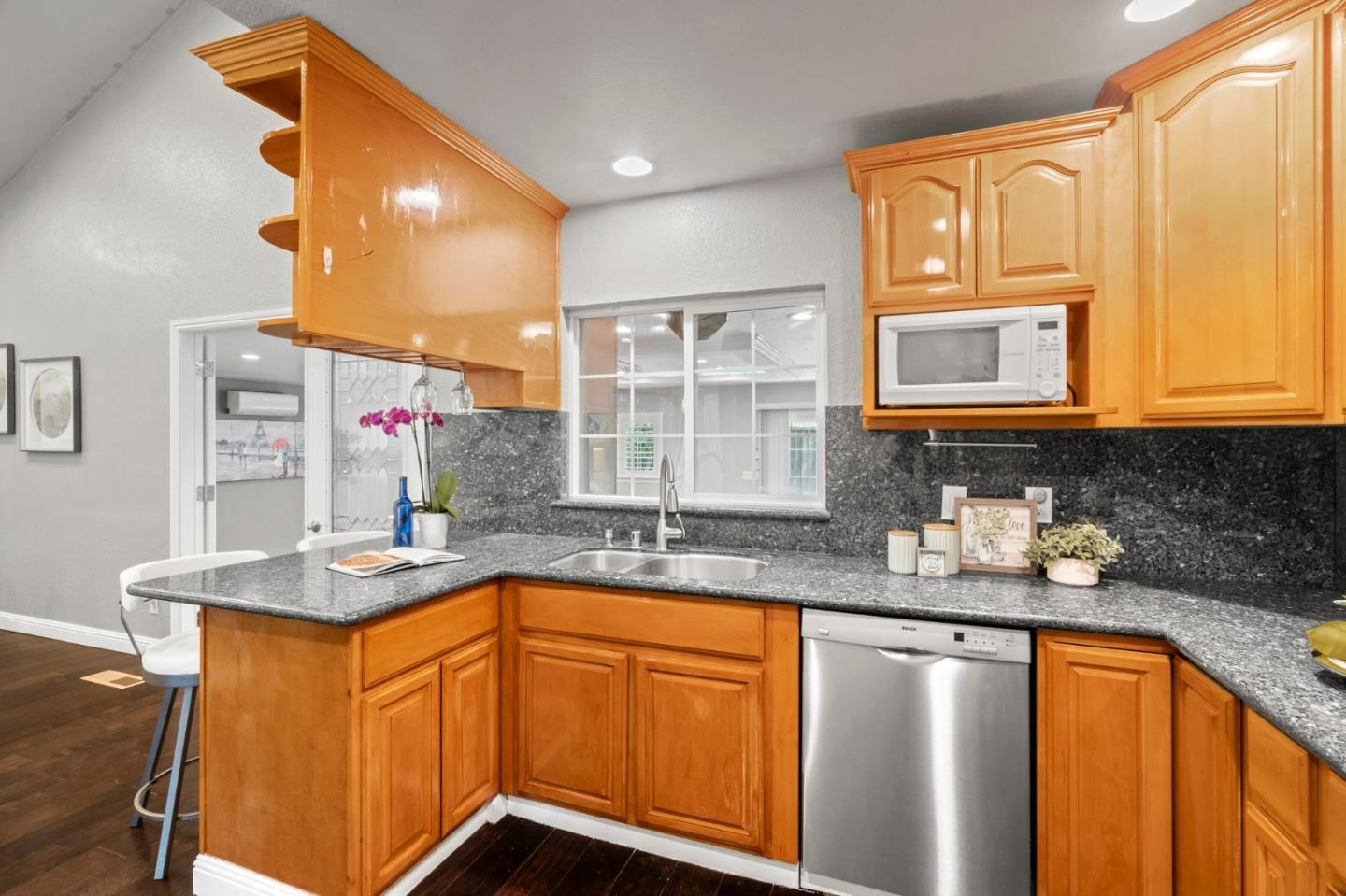 489 Hassinger Road San Jose, CA 95111 - Photo 16 of 41 a kitchen with stainless steel appliances granite countertop a sink and cabinets