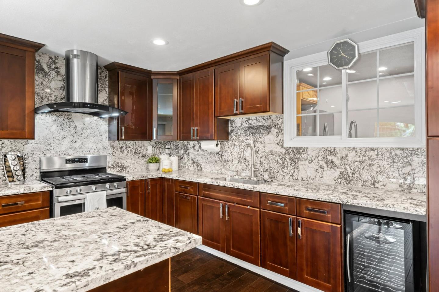 489 Hassinger Road San Jose, CA 95111 - Photo 19 of 41 a kitchen with stainless steel appliances granite countertop a sink stove and cabinets