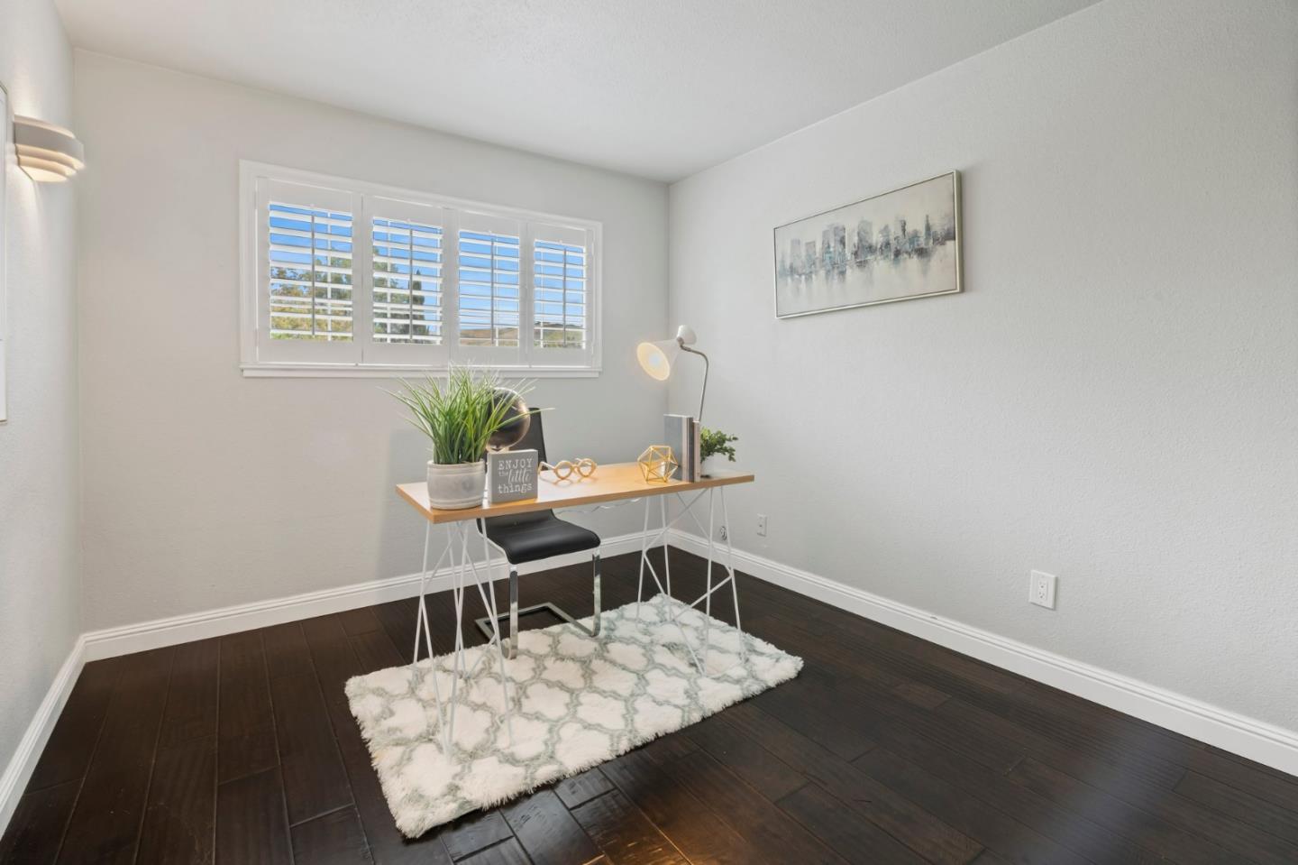 489 Hassinger Road San Jose, CA 95111 - Photo 36 of 41 a view of a workspace with furniture and a window