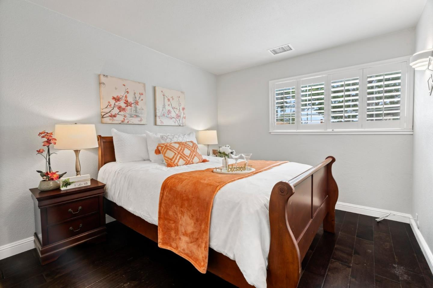 489 Hassinger Road San Jose, CA 95111 - Photo 38 of 41 a bedroom with a bed and wooden floor