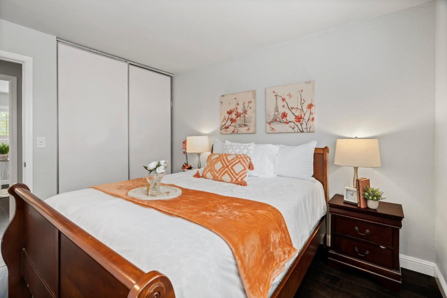 489 Hassinger Road San Jose, CA 95111 - Photo 39 of 41 a spacious bedroom with a bed and a lamp on dresser