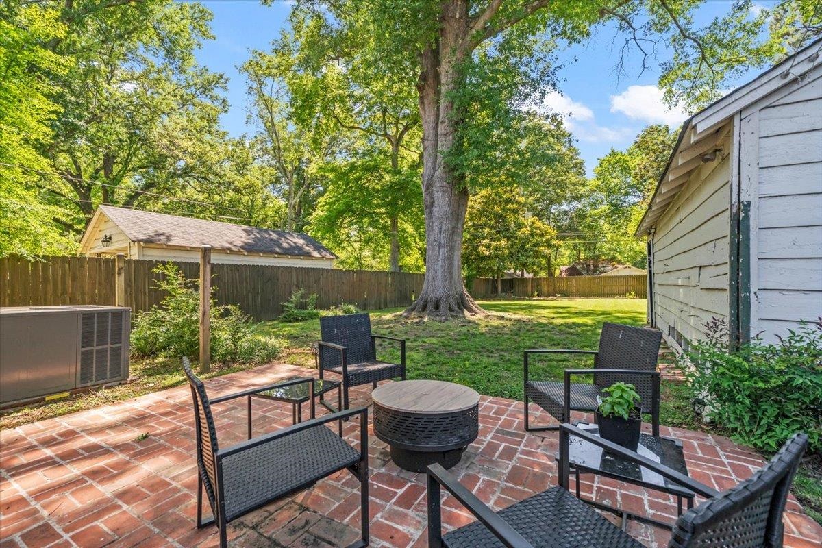 381 Ellsworth Street Memphis, TN 38111 - Photo 28 of 32 a view of a yard with a patio