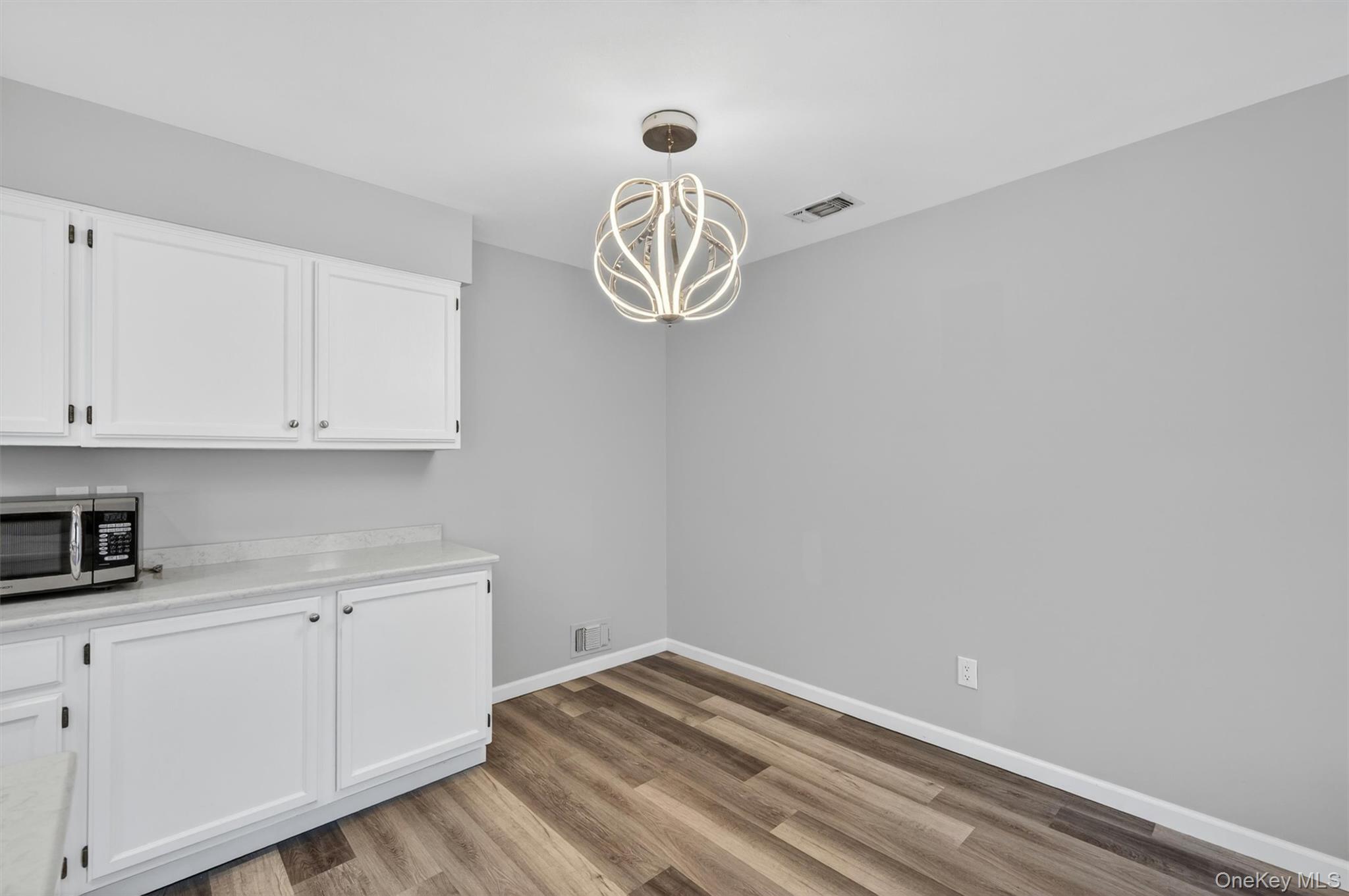 43 The Rise Warwick, NY 10990 - Photo 20 of 49 a view of a kitchen with cabinets and wooden floor