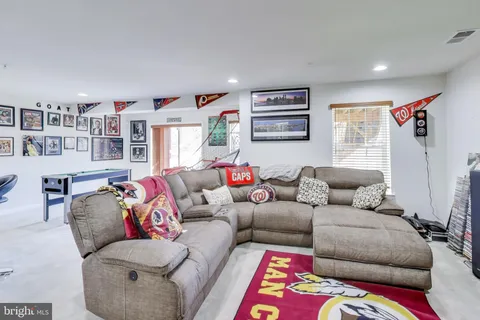 a living room with furniture and a couch