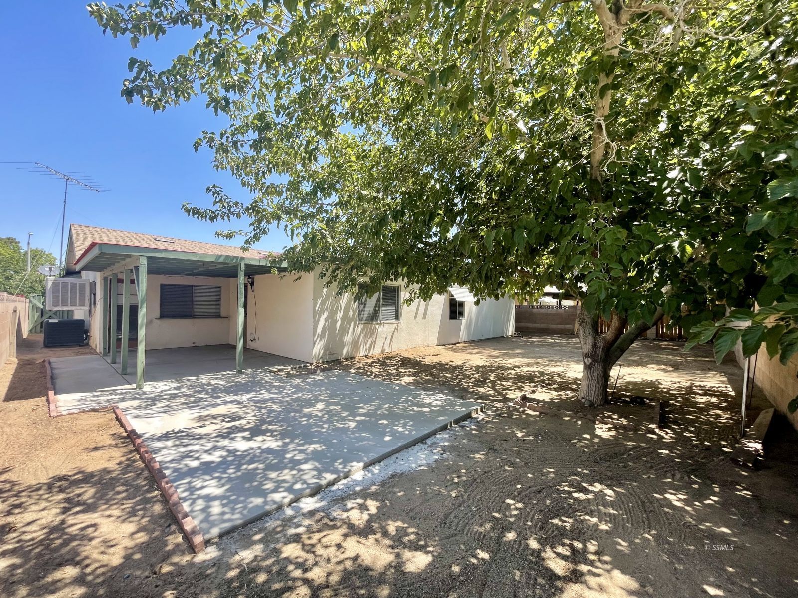 225 East Rader Avenue Ridgecrest, CA 93555 - Photo 29 of 30 a view of a house with a tree