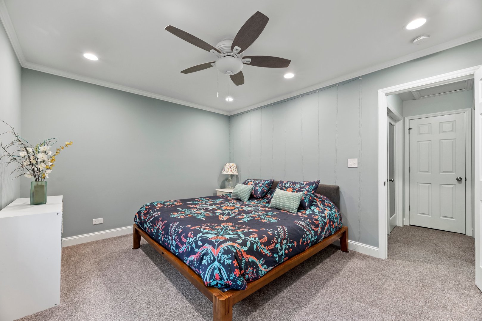 1641 Timber Trail, Unit A Wheaton, IL 60189 - Photo 8 of 16 a bedroom with a bed and a potted plant