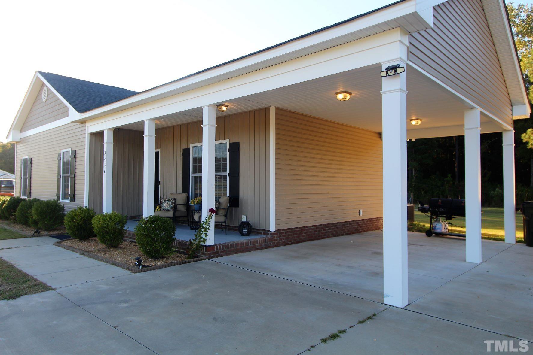 5436 Shepherd Road Wilson, NC 27893 - Photo 3 of 28 a view of a building with glass windows