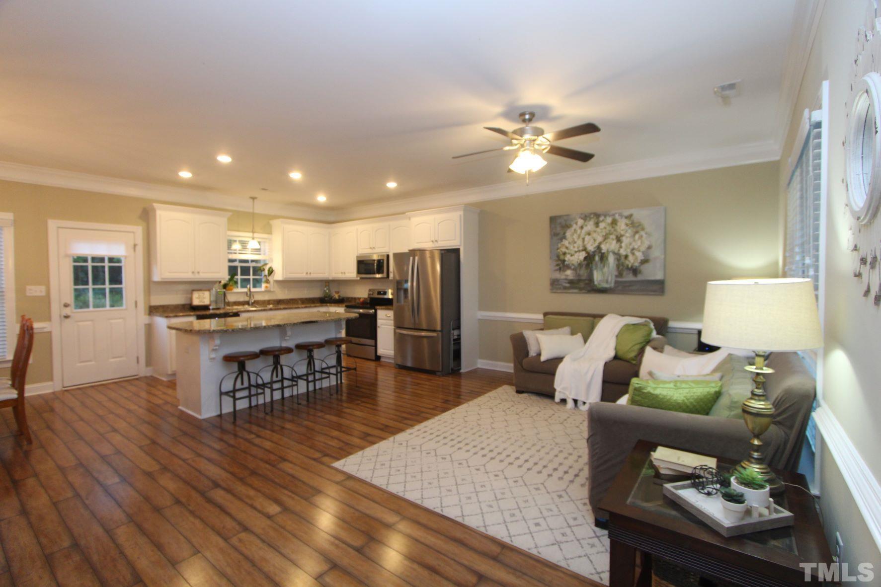 5436 Shepherd Road Wilson, NC 27893 - Photo 5 of 28 a living room with furniture and kitchen view