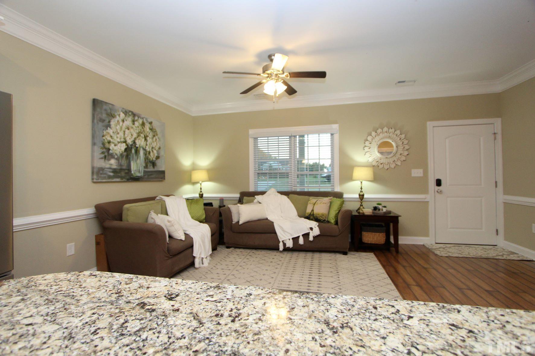 5436 Shepherd Road Wilson, NC 27893 - Photo 7 of 28 a bedroom with a bed and a couch
