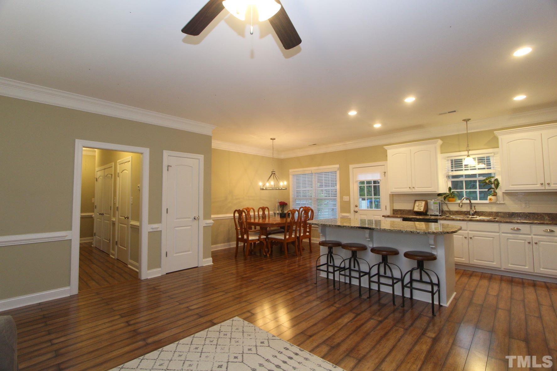 5436 Shepherd Road Wilson, NC 27893 - Photo 9 of 28 a view of a dining room with furniture window and wooden floor