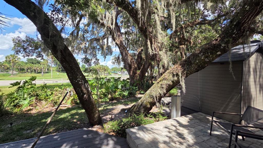 291 Bear Trail River Ranch, FL 33867 - Photo 21 of 23 a backyard of a house with lots of green space