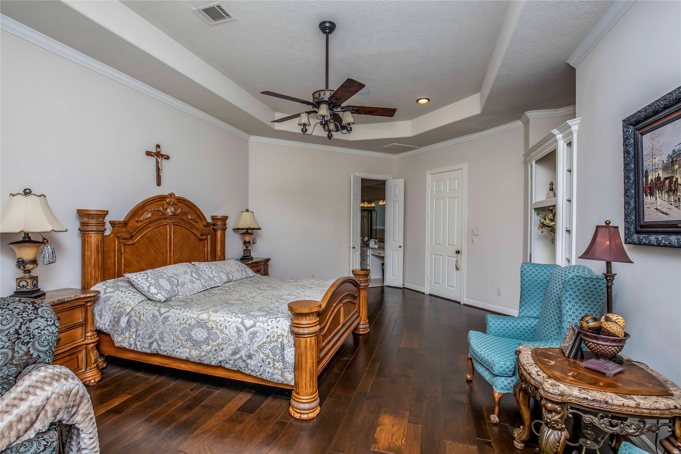 25219 Hideaway Run Drive Spring, TX 77389 - Photo 28 of 45 a bedroom with a bed and wooden floor