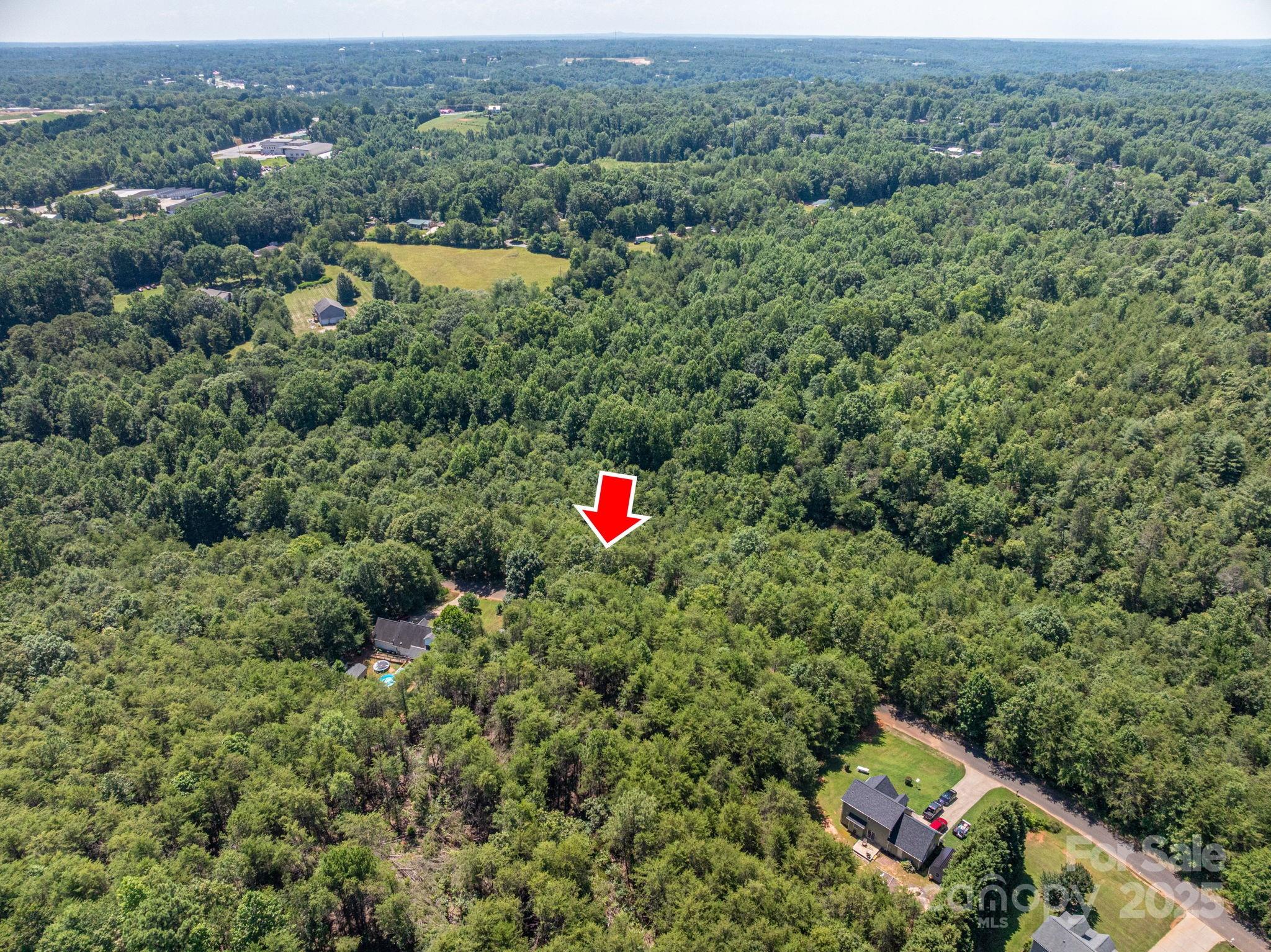 Lot 10 Meadow Crossing Drive Rutherfordton, NC 28139 - Photo 3 of 10 an aerial view of a house with a yard