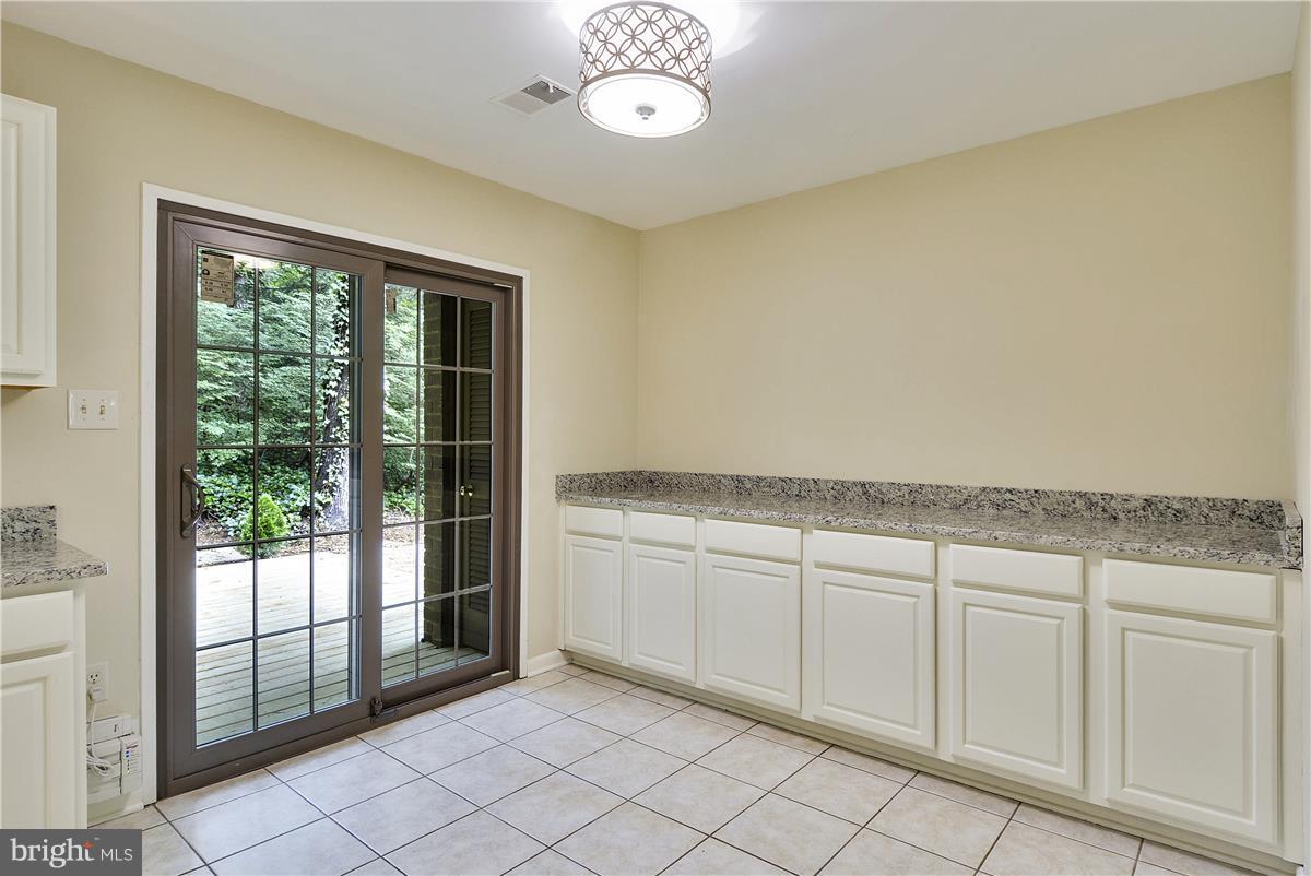 2000 Headlands Circle Reston, VA 20191 - Photo 11 of 23 a view of a kitchen with natural light