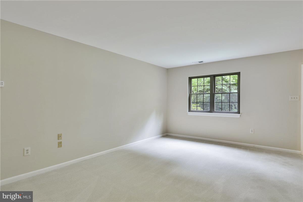 2000 Headlands Circle Reston, VA 20191 - Photo 15 of 23 an empty room with windows