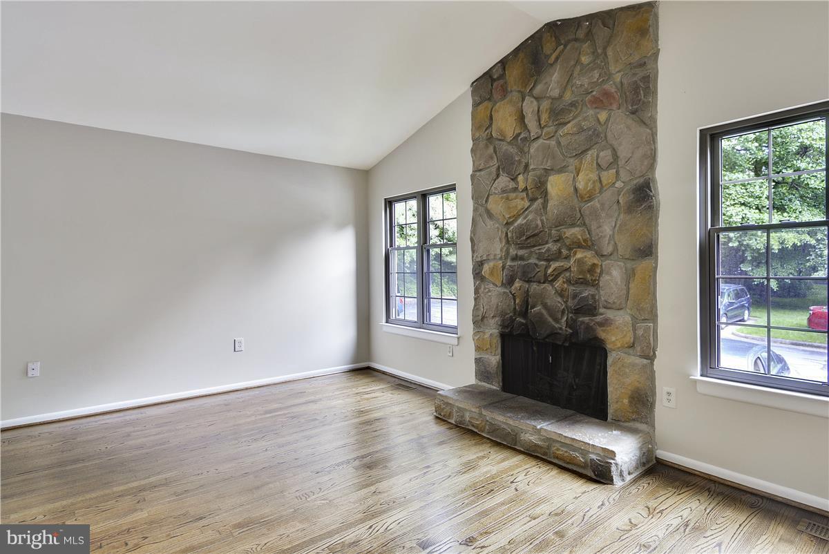 2000 Headlands Circle Reston, VA 20191 - Photo 5 of 23 a view of wooden floor and windows in a room