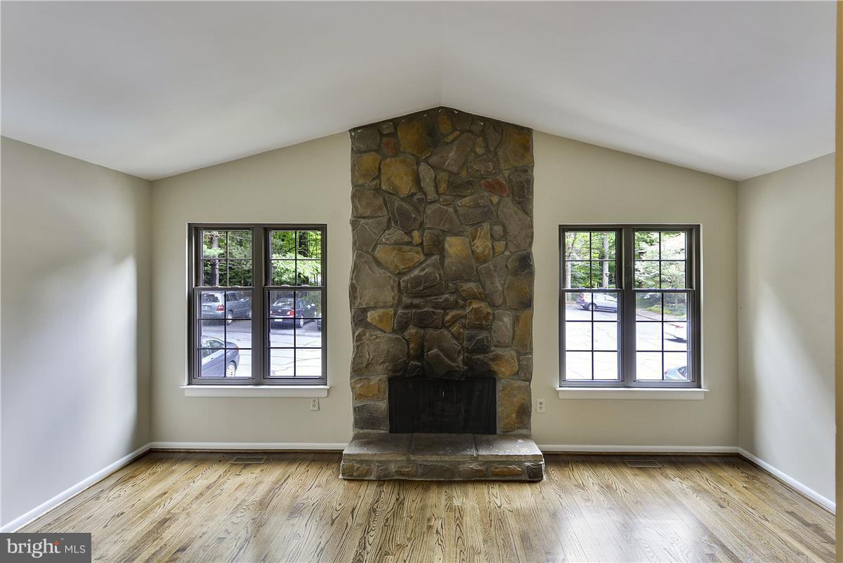 2000 Headlands Circle Reston, VA 20191 - Photo 6 of 23 an empty room with wooden floor and windows