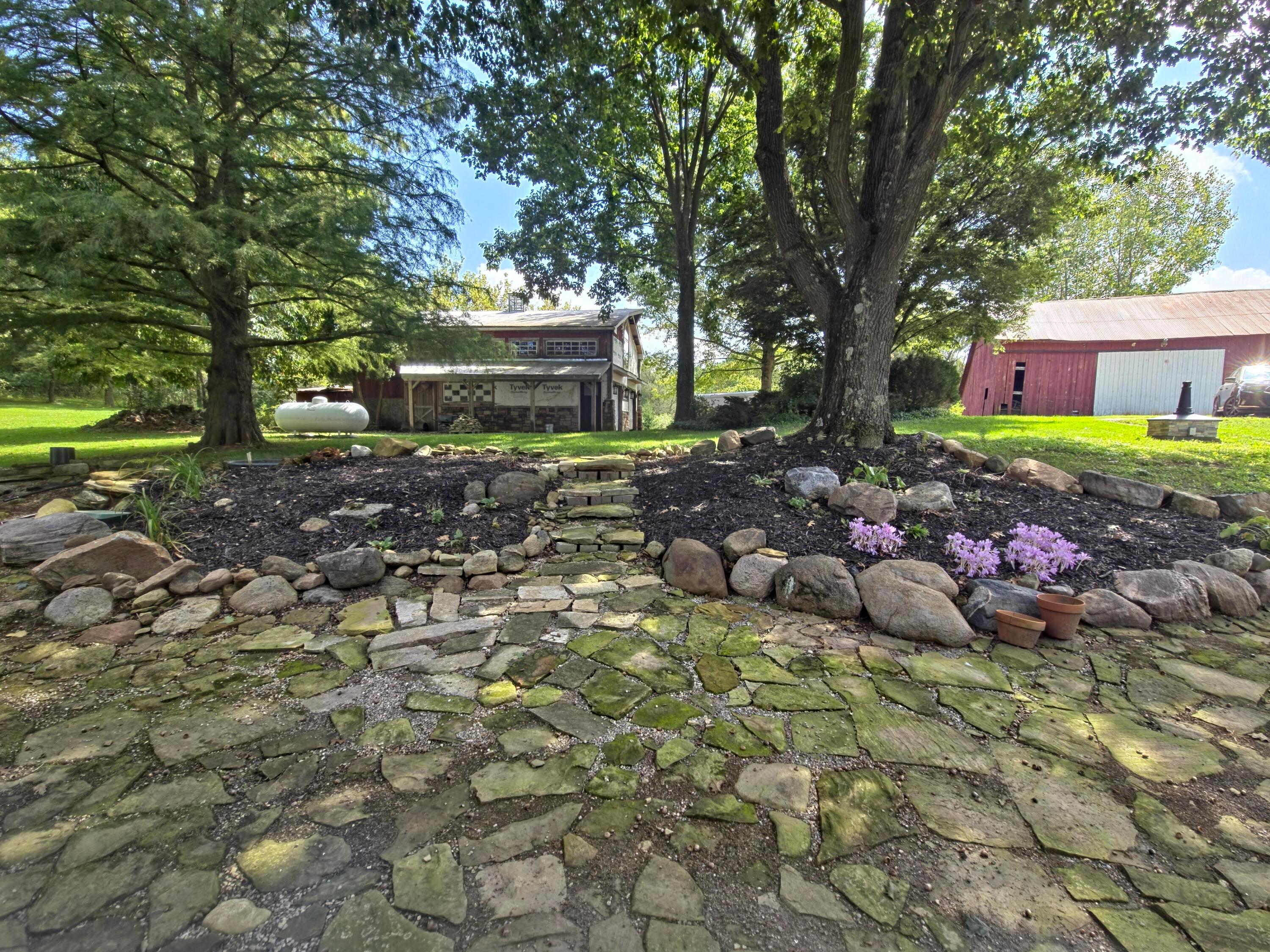 2953 Headleys Mill Road Southwest Pataskala, OH 43062 - Photo 72 of 107 walkway on side of the house