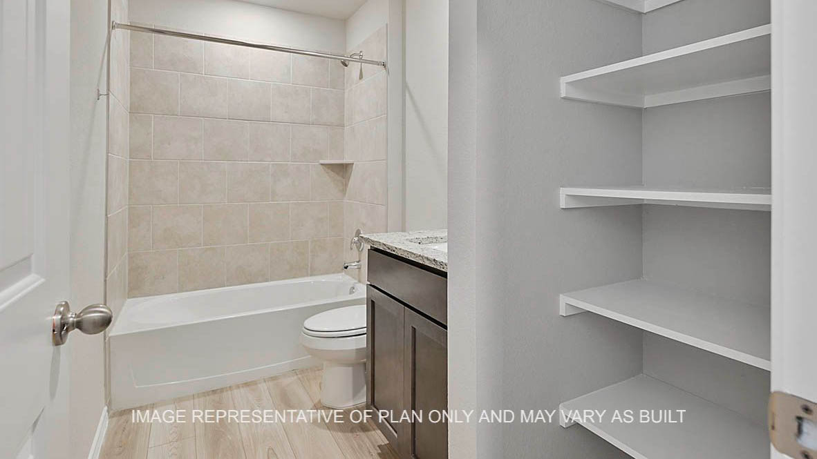 449 Combine Road Snook, TX 77879 - Photo 16 of 18 a bathroom with a toilet and a shower