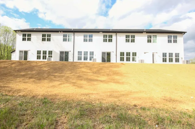 a front view of house with yard
