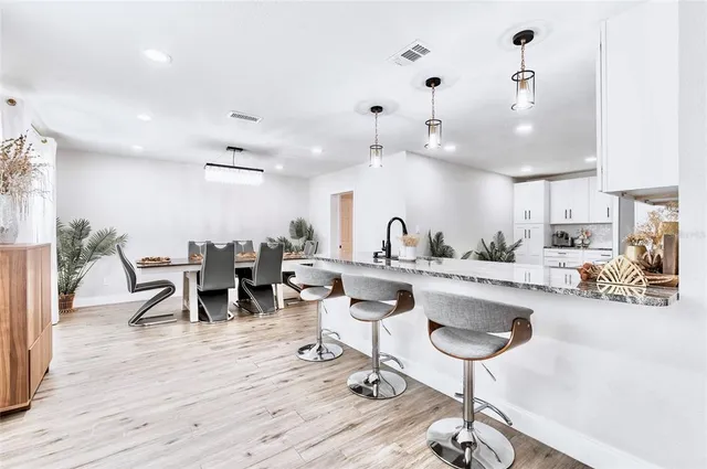 a kitchen with lots of counter space furniture and kitchen view