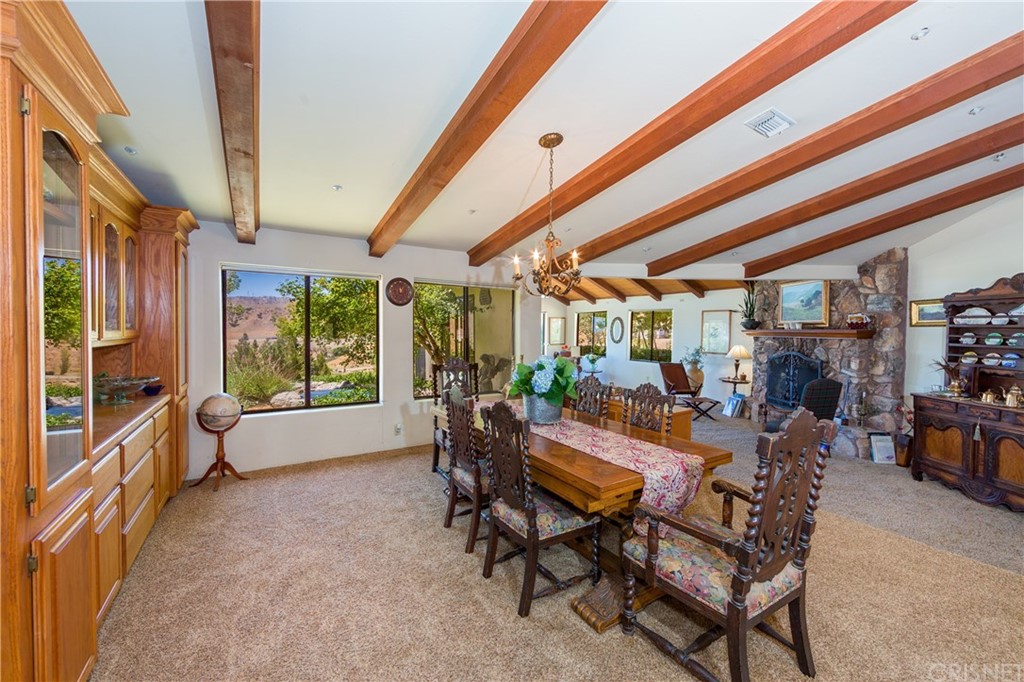 38833 Gorman Post Road Lebec, CA 93243 - Photo 16 of 55 a living room with furniture and a large window