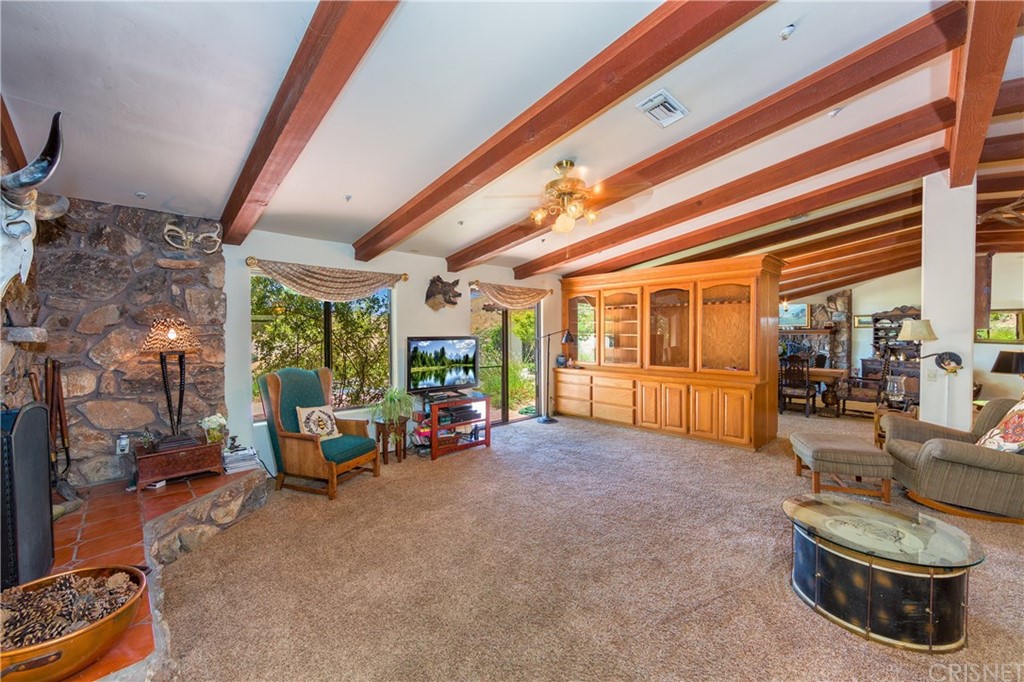 38833 Gorman Post Road Lebec, CA 93243 - Photo 17 of 55 a living room with furniture and a large window