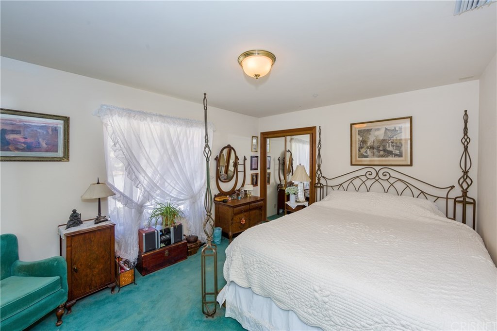 38833 Gorman Post Road Lebec, CA 93243 - Photo 27 of 55 a bed room with a bed and a television