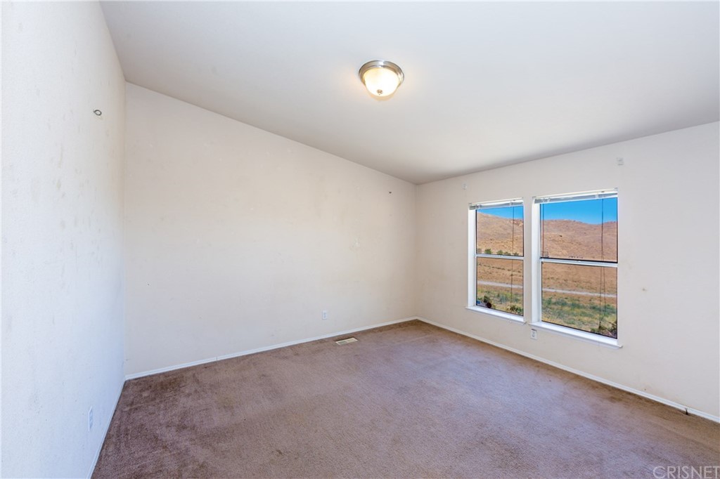 38833 Gorman Post Road Lebec, CA 93243 - Photo 30 of 55 an empty room with windows