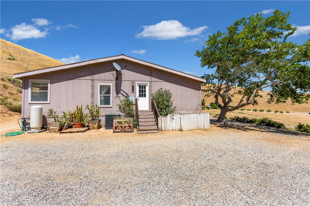 38833 Gorman Post Road Lebec, CA 93243 - Photo 33 of 55 a view of a house with a patio