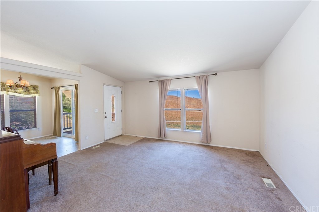 38833 Gorman Post Road Lebec, CA 93243 - Photo 40 of 55 an empty room with windows