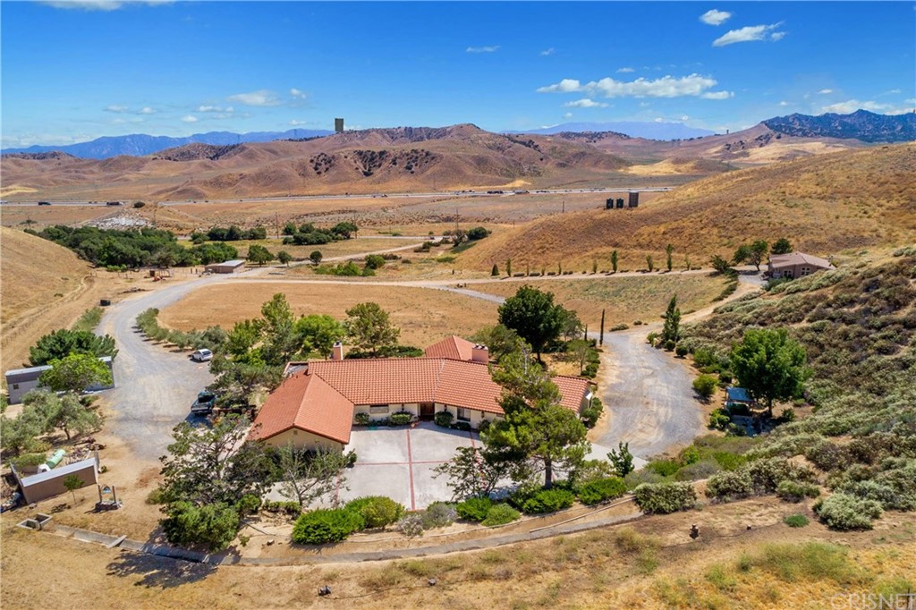 38833 Gorman Post Road Lebec, CA 93243 - Photo 46 of 55 an aerial view of a house with a lake view