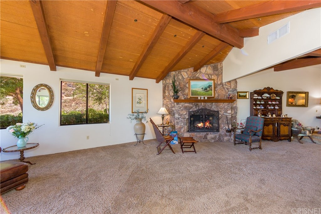 38833 Gorman Post Road Lebec, CA 93243 - Photo 9 of 55 a living room with furniture and a fireplace