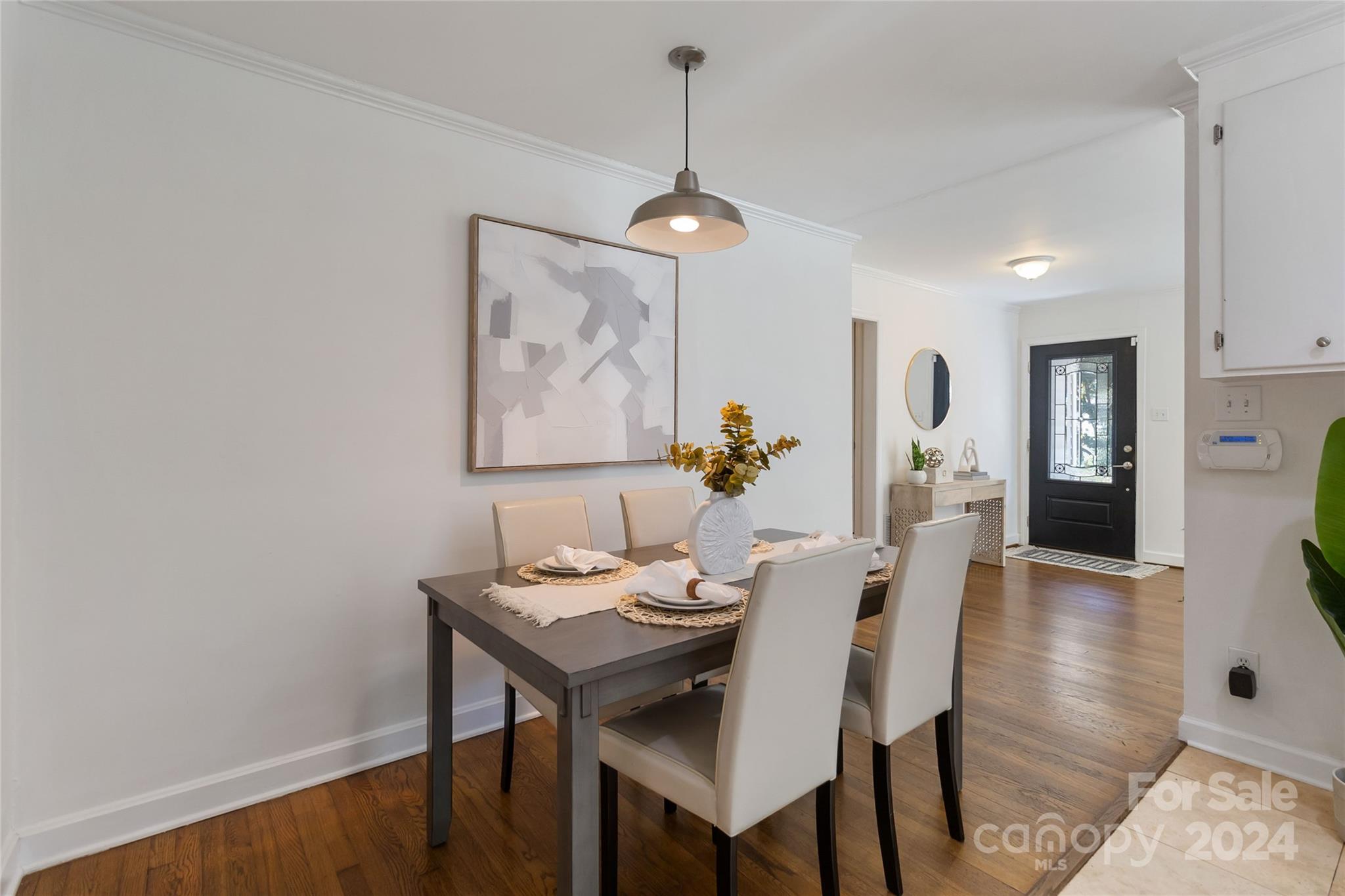 4346 Applegate Road Charlotte, NC 28209 - Photo 9 of 35 a view of a dining room with furniture and wooden floor