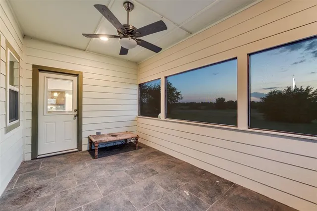 a view of a door and window in a room