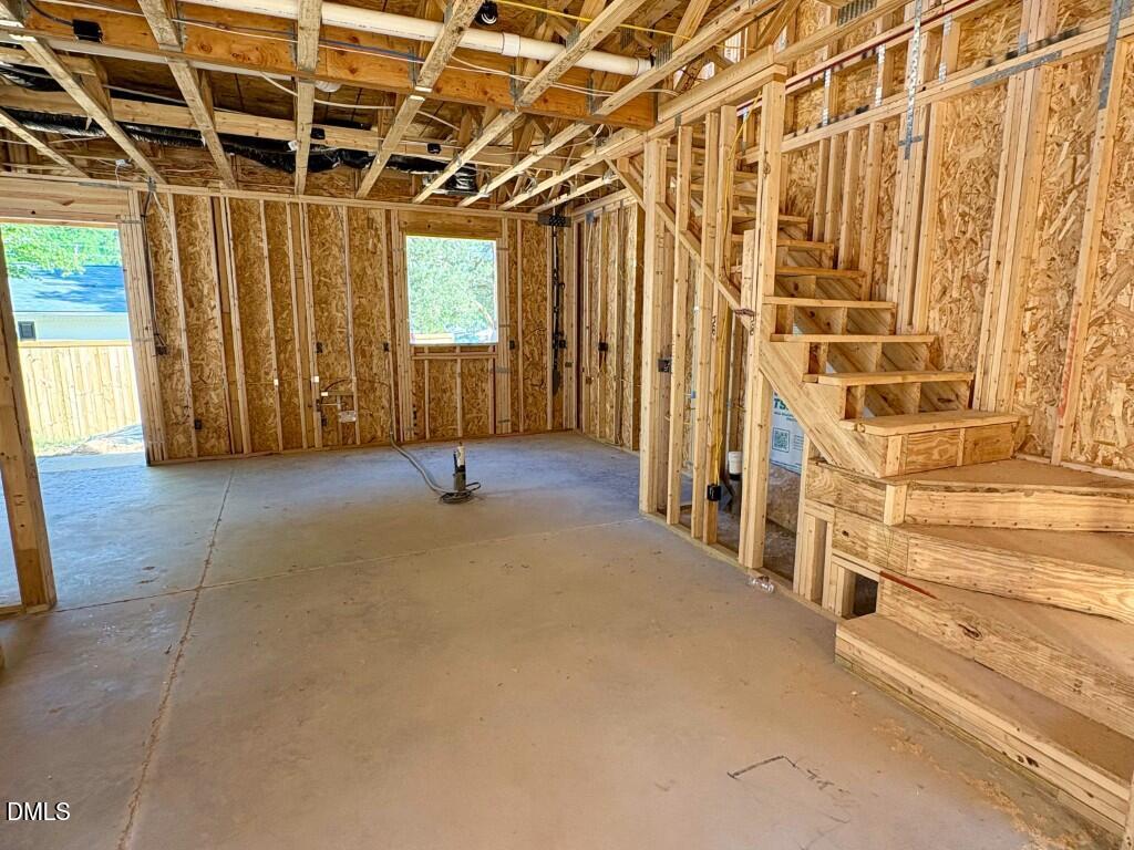 2941 Duke Homestead Road Durham, NC 27705 - Photo 9 of 13 a view of an empty room with a window