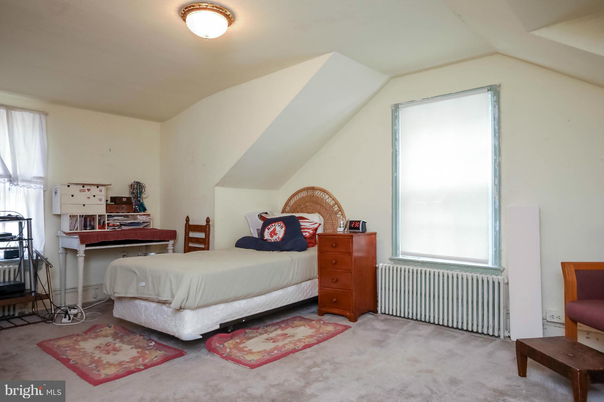 2801 Ridge Rd Drive Alexandria, VA 22302 - Photo 24 of 25 a bedroom with a bed and a window