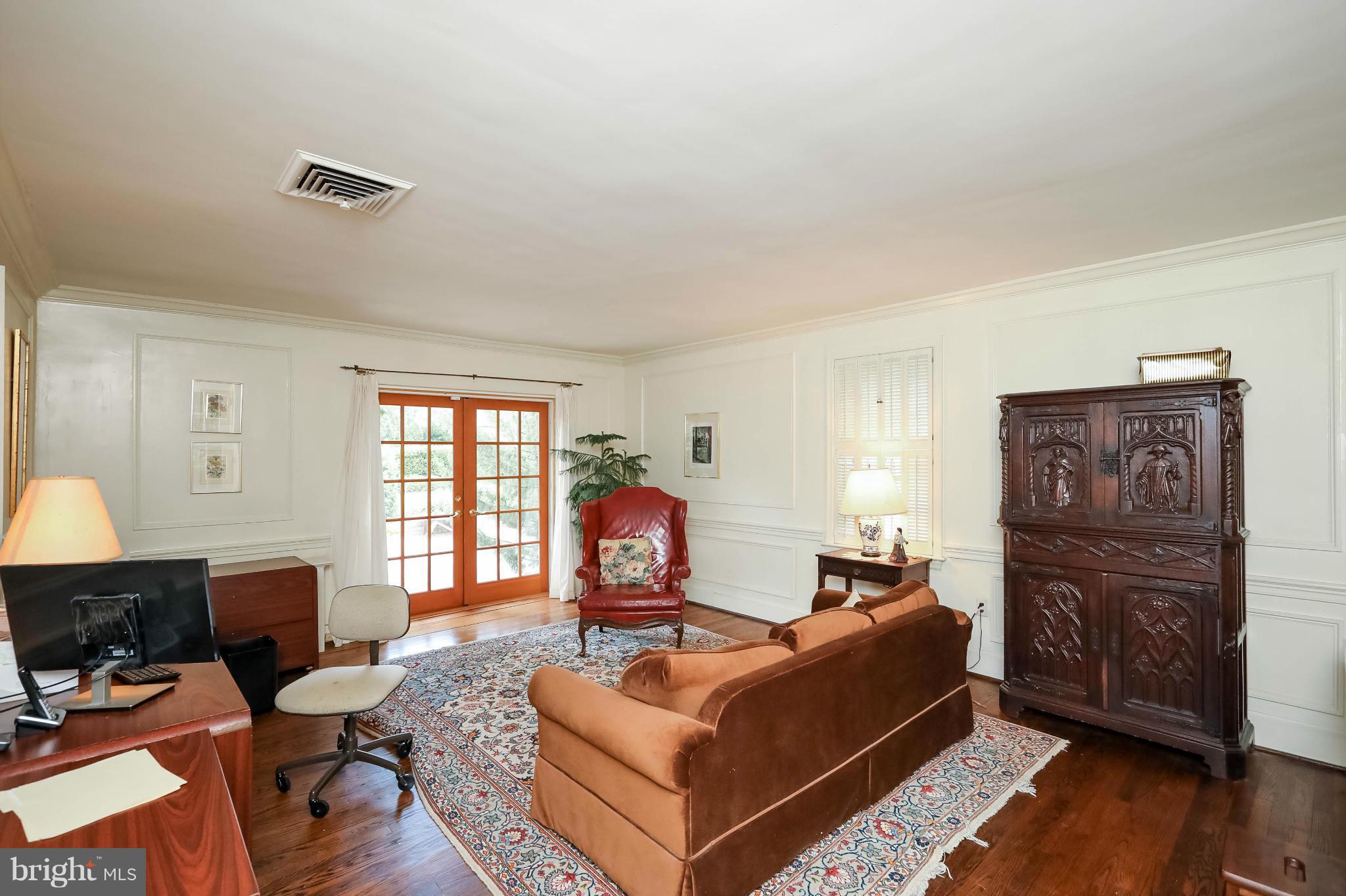 2801 Ridge Rd Drive Alexandria, VA 22302 - Photo 5 of 25 a living room with furniture a fireplace and a window