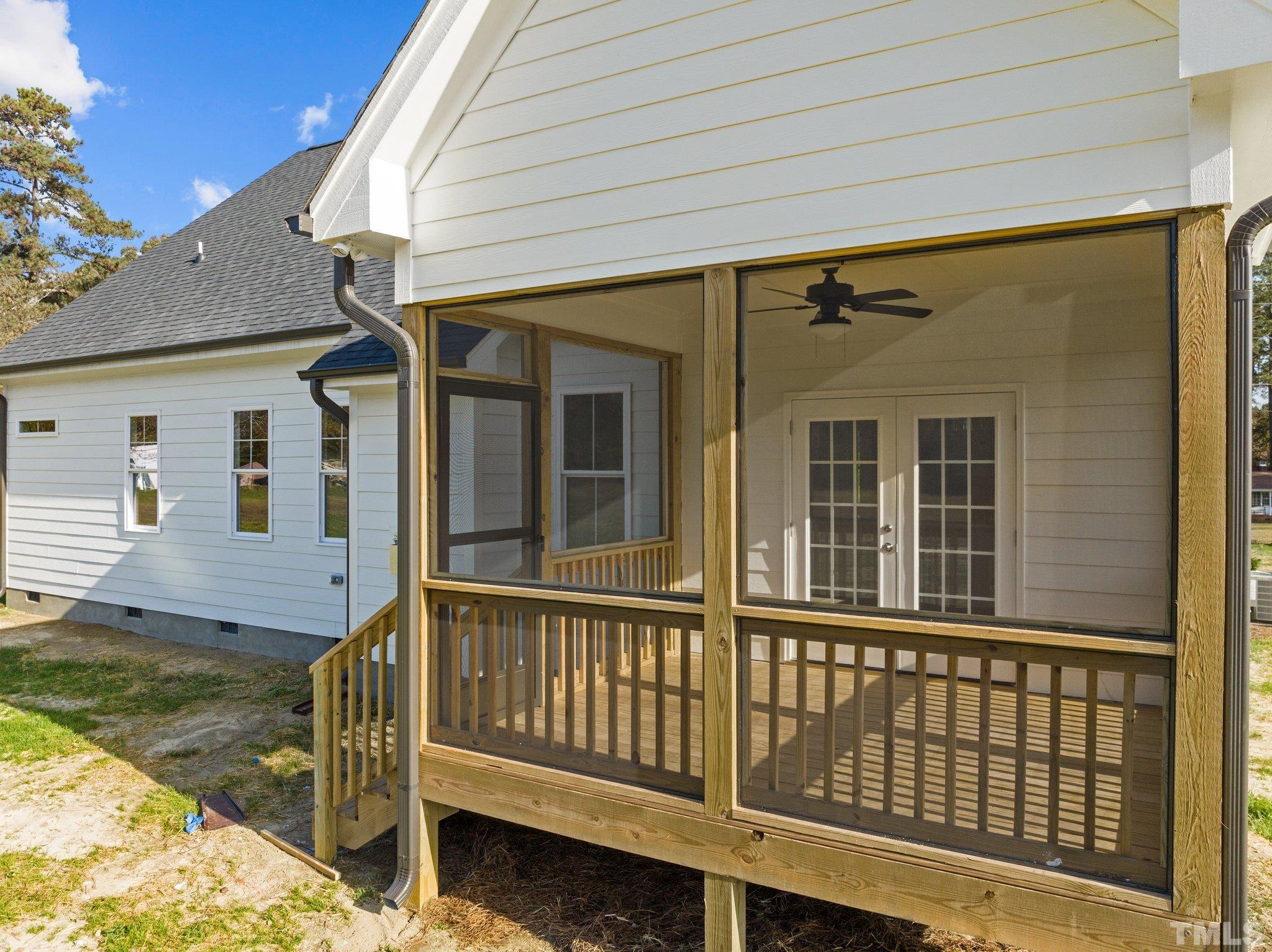 454 Pine Ridge Road Zebulon, NC 27597 - Photo 40 of 42 a view of a house with wooden fence