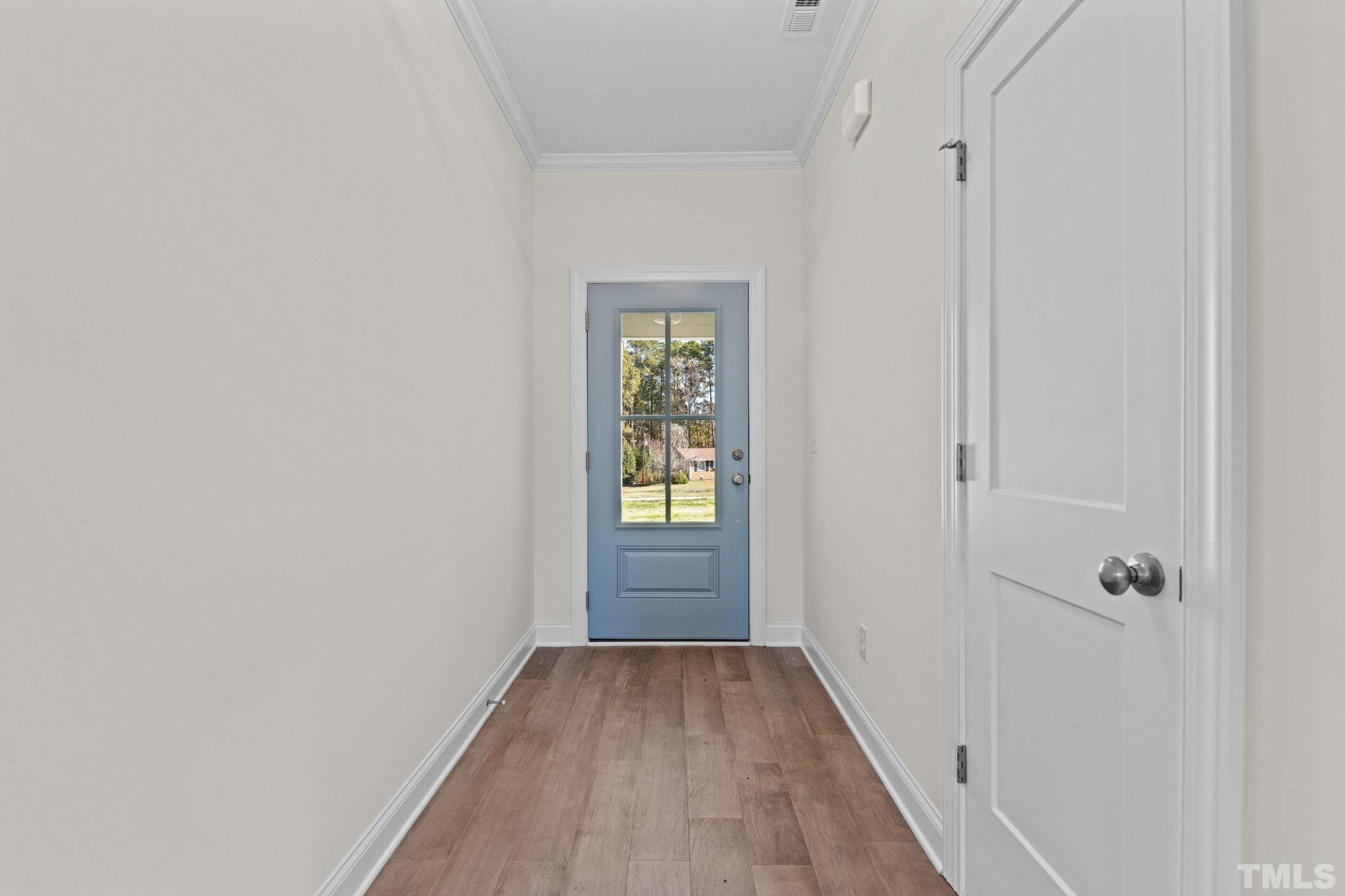 454 Pine Ridge Road Zebulon, NC 27597 - Photo 4 of 42 a view of hallway with window