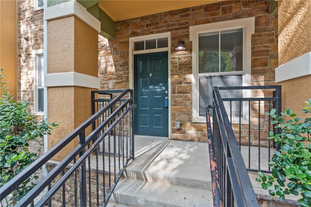 10 Perimeter Summit Boulevard, Unit 4131 Brookhaven, GA 30319 - Photo 1 of 1 a view of staircase with railing and a potted plant