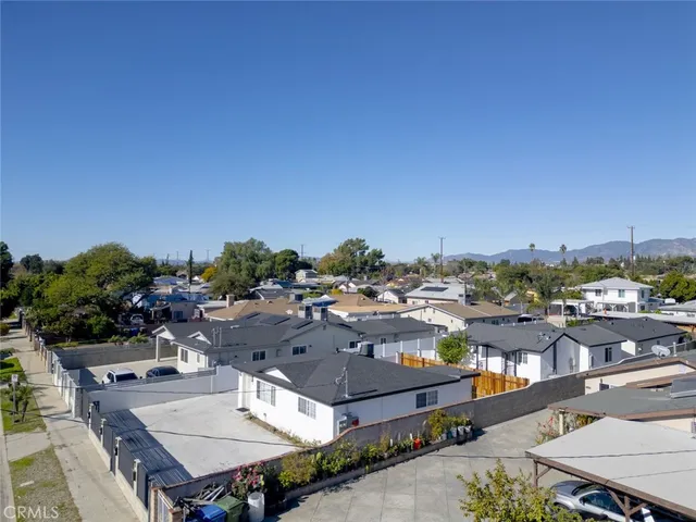 a view of a terrace with wooden floor and fence