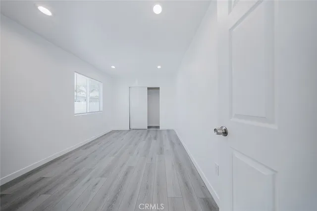 a bathroom with a sink a toilet a shower and a mirror